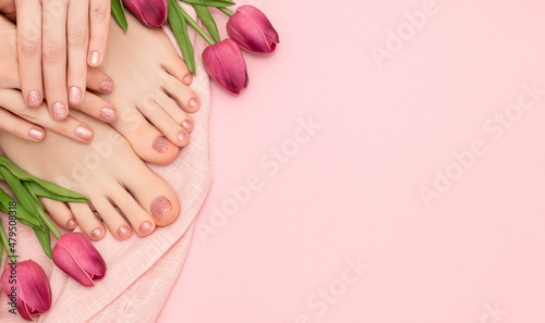 Tela Female hands with spring nail design
