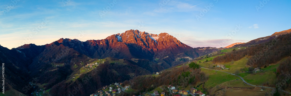 Beautiful panorama of the Seriana valley and its mountains at sunrise, Orobie Alps, Bergamo, Italy