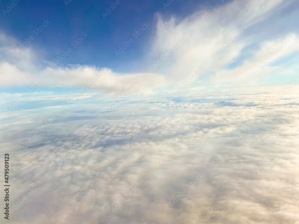 Naklejka premium background sky with clouds, top view from an airplane 