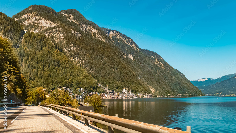 Beautiful alpine summer view with reflections at the famous Hallstaetter See lake, Hallstatt, Upper Austria, Austria