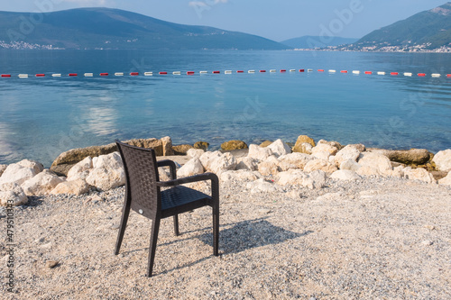 An empty  beach chair by the Adriatic seaside in Montenegro. 