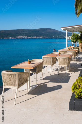Empty chair and table with outdoor view. Tivat Porto Montenegro
