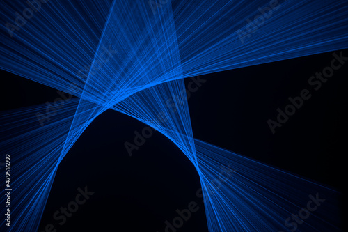 Abstract blue lines drawn by light on a black background