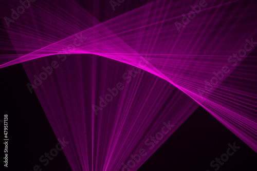 Abstract purple lines drawn by light on a black background