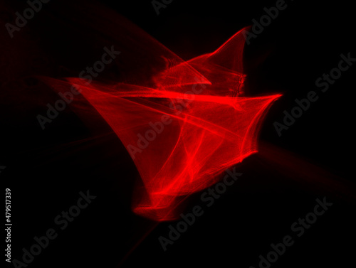 Abstract red lines drawn by light on a black background