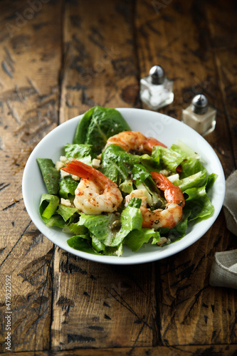 Homemade Caesar salad with shrimps