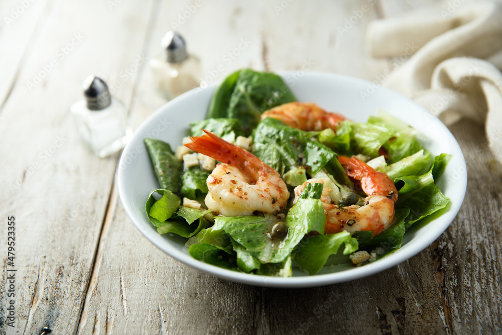 Homemade Caesar salad with shrimps