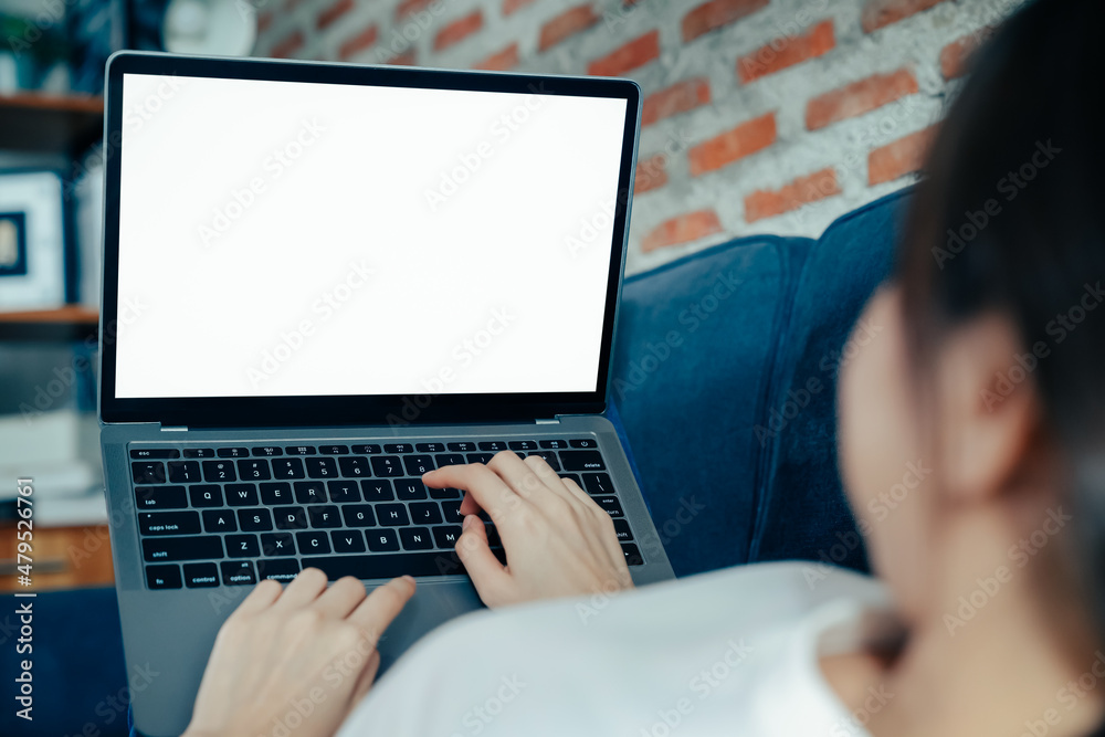 Woman using laptop with blank copy space screen for your advertisement. Woman using laptop with blank copy space screen for your advertisement.