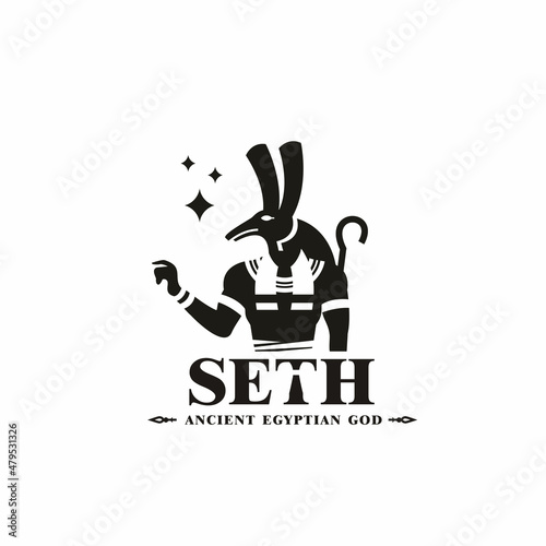 Ancient egyptian god seth silhouette. middle east storm king with crown and scepter  photo