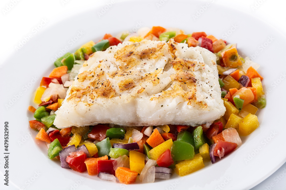 Grilled cod with vegetables in plate isolated on white background Grilled cod with vegetables in plate isolated on white background