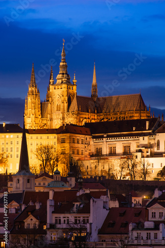 Evening Prague, view of the Vitus Cathedral against the blue sky, cityscape
