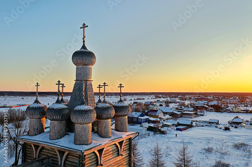 Obraz na plátně wooden church winter top view, landscape russian north architecture