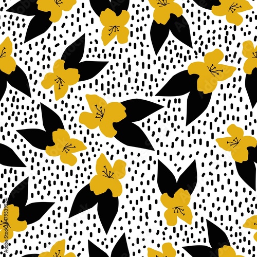 Beautiful vintage pattern. Yellow flowers  black leaves and dots. White background. Floral seamless background. An elegant template for fashionable prints.