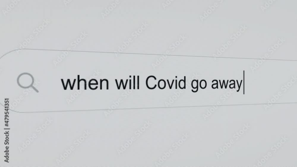 When will Covid go away? - Pc screen internet browser search engine bar typing coronavirus related question.