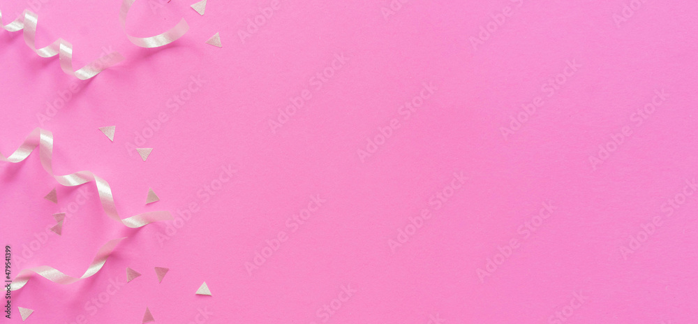 white color of rolling ribbon and confetti on pink background with copy space for valentine and mother's day and women's day celebration design concept	