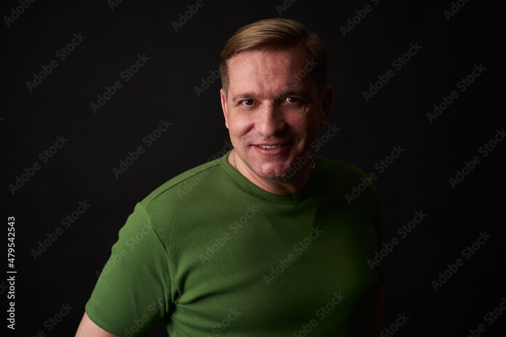 Handsome smiling middle aged man studio portrait Handsome smiling middle aged man studio portrait