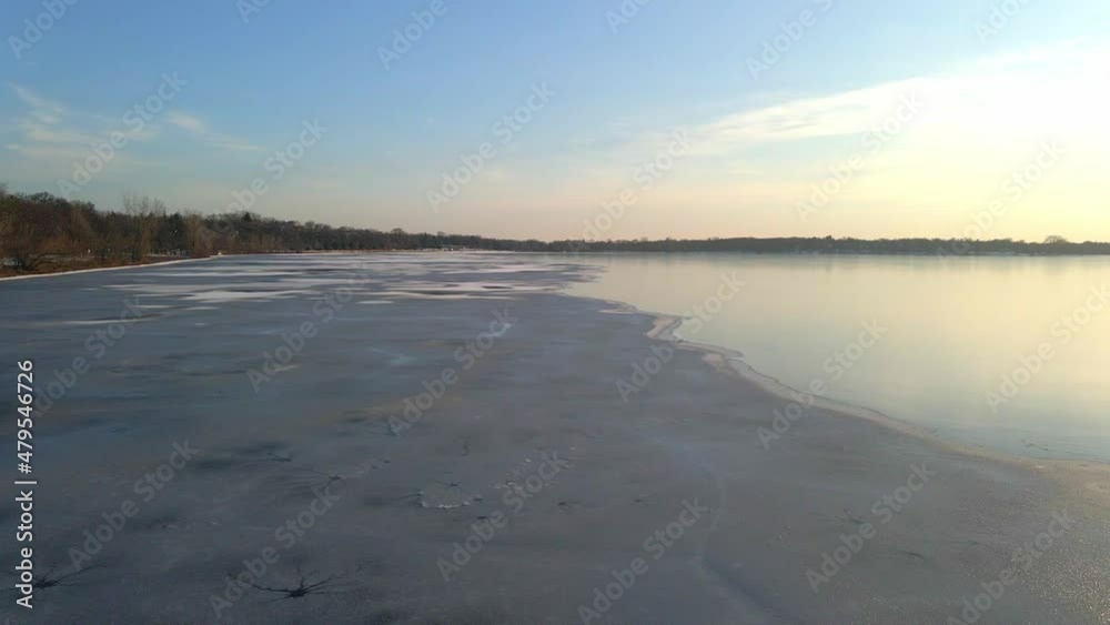 Lake Completely frozen without snow reflections on the ice aerial view Lake Completely frozen without snow reflections on the ice aerial view