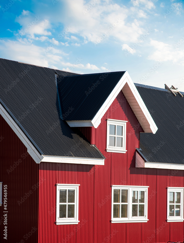 Facade of a traditional Scandinavian house with red walls