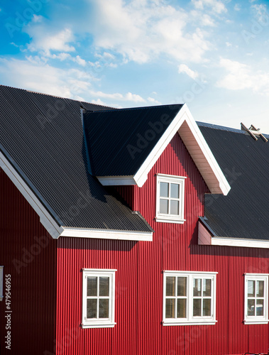 Facade of a traditional Scandinavian house with red walls