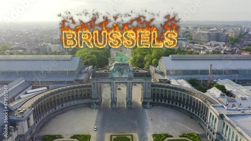 Inscription on video. Brussels, Belgium. Park of the Fiftieth Anniversary. Park Senkantoner. The Arc de Triomphe of Brussels (Brussels Gate). Name is burning, Aerial View photo