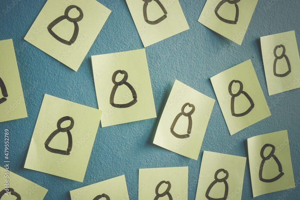 Drawn people figures on the stickers as symbol of customers or employee. Drawn people figures on the stickers as symbol of customers or employee.