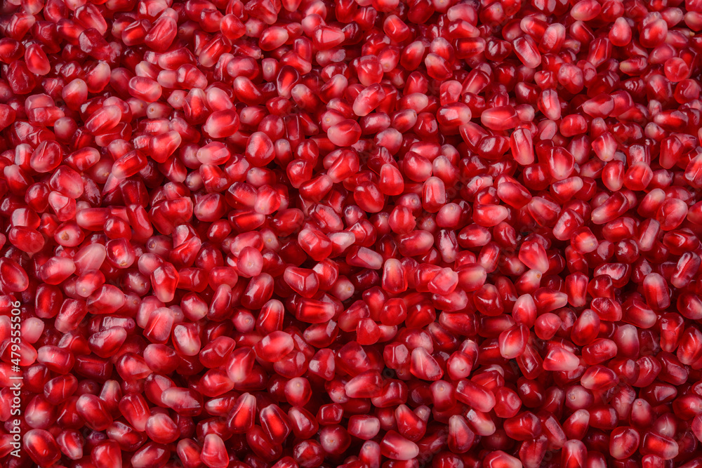 Pomegranate background. Pomegranate seeds top view. Pomegranate seeds macro flat design. Pomegranate background. Pomegranate seeds top view. Pomegranate seeds macro flat design.