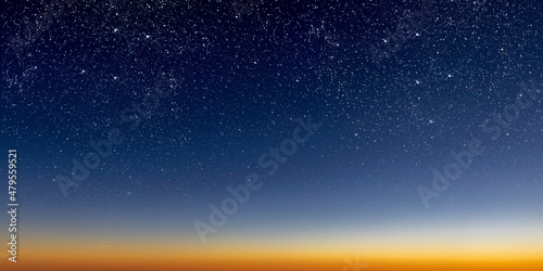 a beautiful dawn of the sun with stars, gradient from blue to red