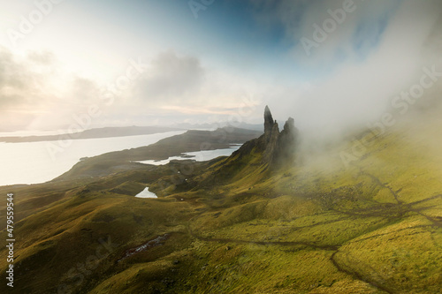 Landscape view at sunset with colourful clouds of Old Man of Storr rock formation, Scotland, United Kingdom.