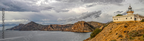 Portman lighthouse in the bay of portman, Cartagena, Murcia, Spain photo