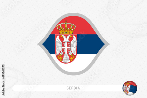 Serbia flag for basketball competition on gray basketball background.