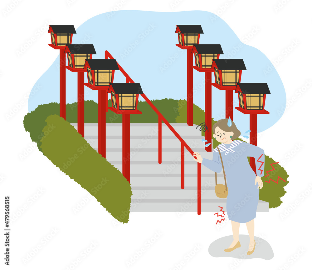 腰と膝が痛くて階段を登るのが辛い女性 腰と膝が痛くて階段を登るのが辛い女性