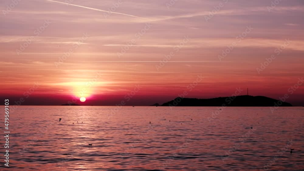 amazing sunset view with sea island and ferryboat amazing sunset view with sea island and ferryboat
