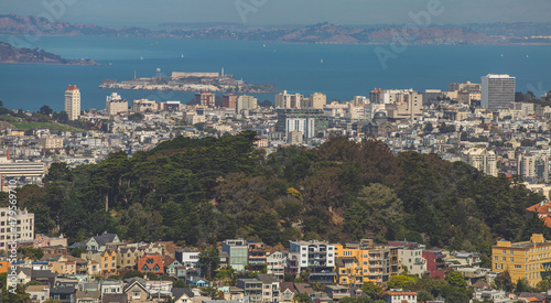 Alcatraz Island, the ocean, Buena Vista Park, and its surrounding neighborhoods viewed from the Twin Peaks
