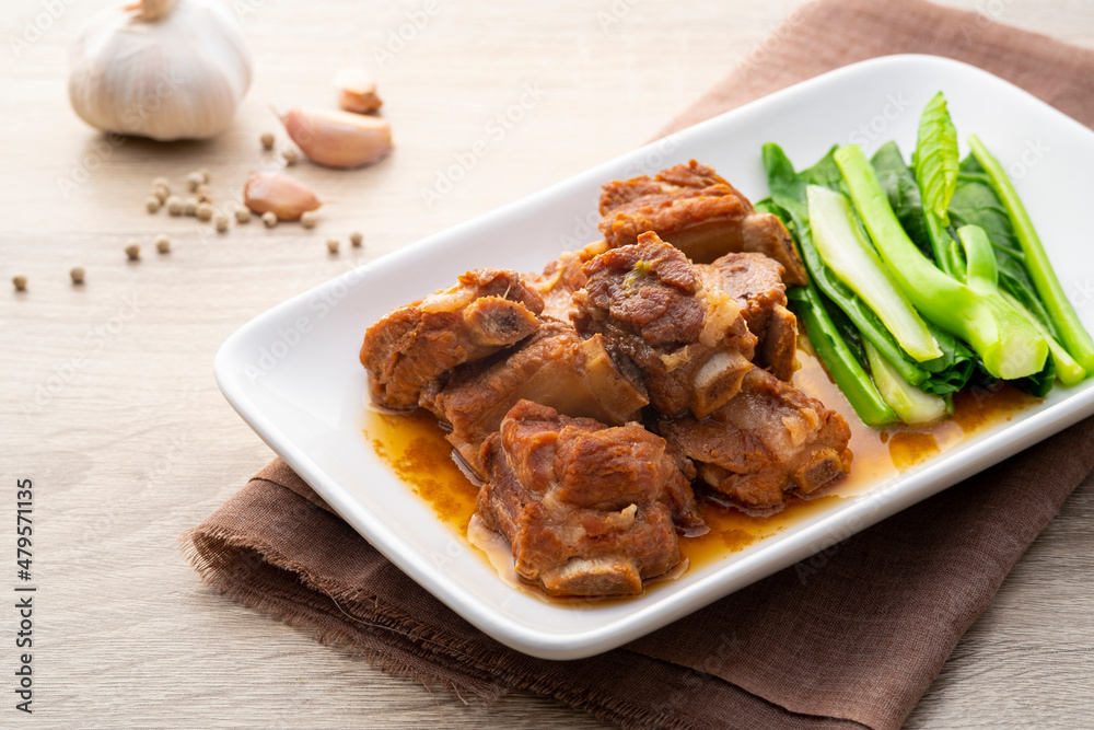 Braised Pork Spare Rib with Honey on white plate Braised Pork Spare Rib with Honey on white plate