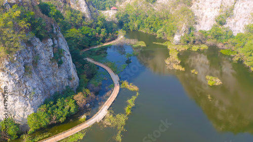 Aerial view of Khao Ngu Stone. National park with river lake  mountain valley hills  and tropical green forest trees at sunset in Ratchaburi  Thailand in travel trip. Natural landscape background.