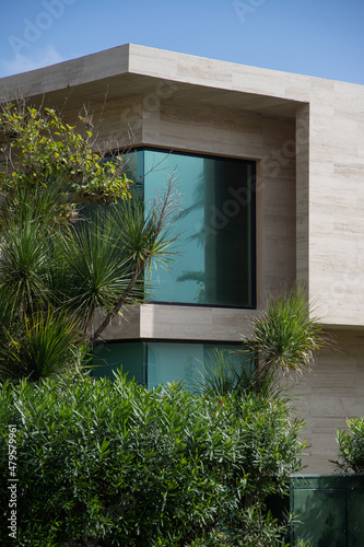 Luxury beach house with sea view and terrace in modern design.