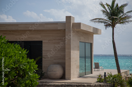 Luxury beach house with sea view and terrace in modern design.