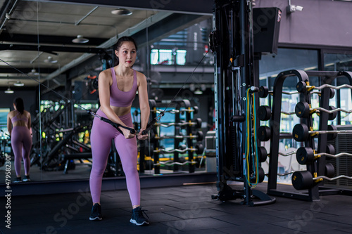 Sport fitness athlete woman with sportwear training weightless equipment at gym for bodybuilding healthy lifestyle concept.  © APchanel