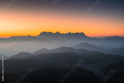 Fototapeta Naklejka Na Ścianę i Meble -  Sunrise over Doi Luang Chiang Dao mountain and foggy on hill in national park from Doi Kham Fah viewpoint