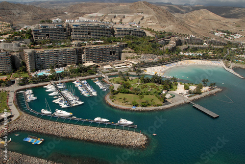 Fotografía aérea de la costa y puerto de Anfi del Mar en la zona sur de la isla de Gran Canaria photo