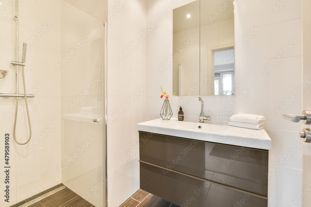 Bathroom with shower cabin and sink Bathroom with shower cabin and sink
