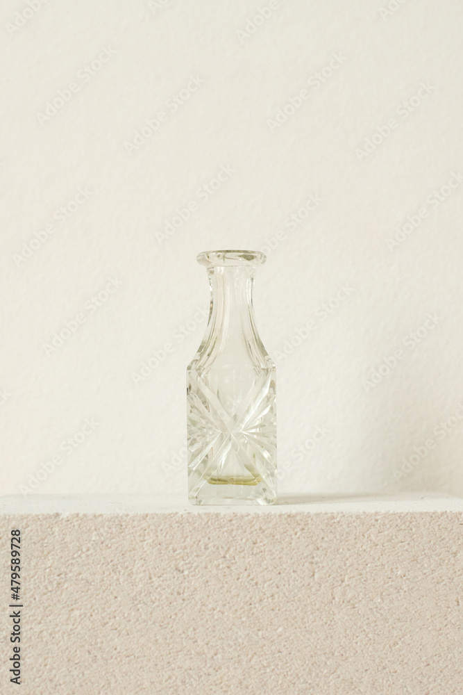 little vintage bottle from glass on the white brick