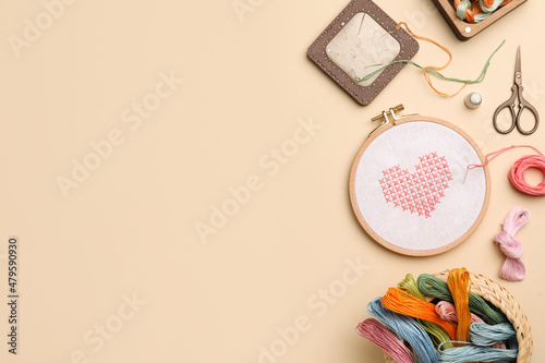 Canvas Print Flat lay composition with embroidery and different sewing accessories on beige background