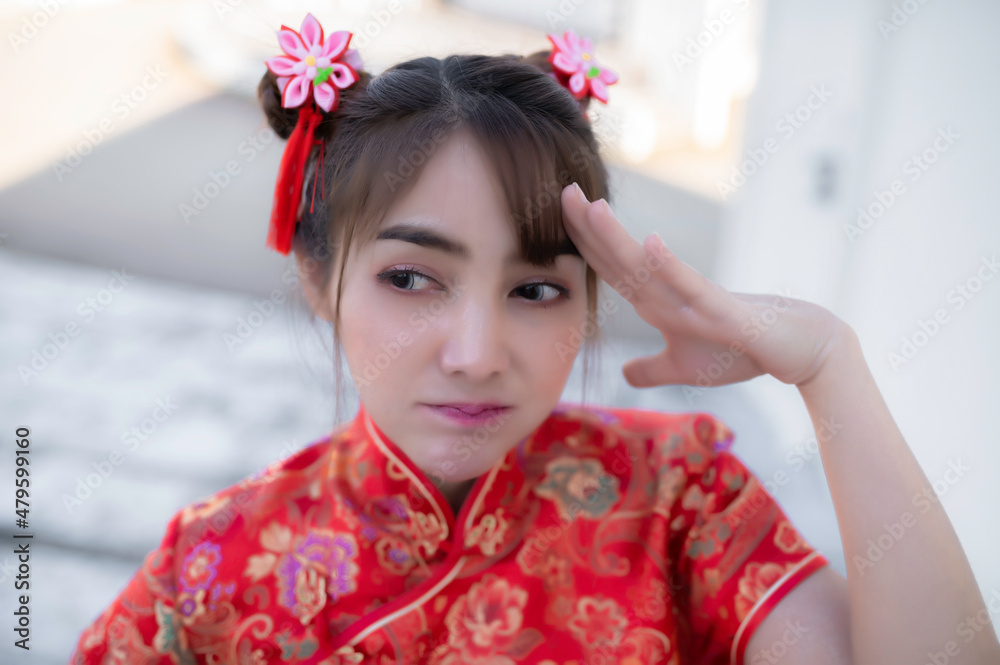 Portrait beautiful asian woman in Cheongsam dress on white background,Thailand people,Happy Chinese new year concept,Happy asian lady in chinese traditional dress Portrait beautiful asian woman in Cheongsam dress on white background,Thailand people,Happy Chinese new year concept,Happy asian lady in chinese traditional dress