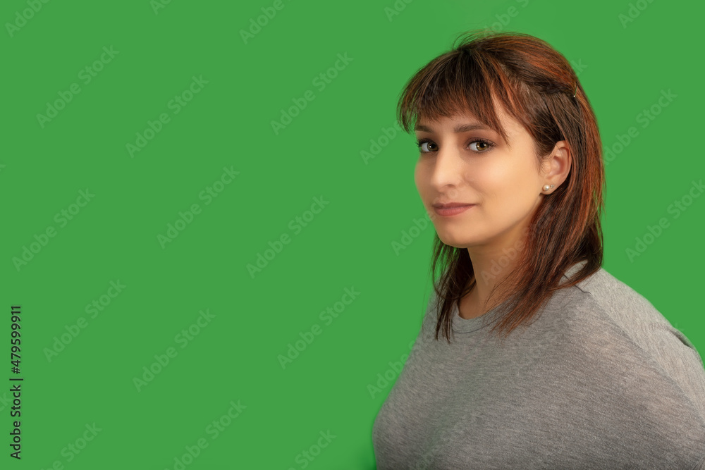 Fototapeta premium redhead woman on green screen lady in her thirties on chromakey background