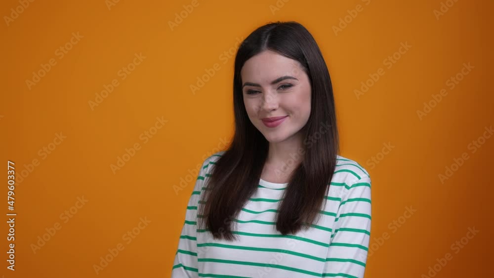 Nice lady toothy smiling look empty space isolated mustard color background