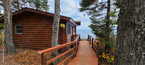 Konstfotografi Cozy Log Cabin in the Wilderness and Near Water