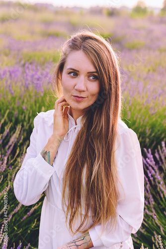 Long-Haired Woman in Blooming Lavender Field