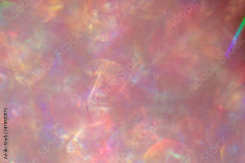 Abstract defocused pink background with shining glitter.Good as overlay layer.