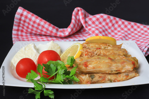 Lahana Sarma, Turkish traditional food,a boiled cabbage leaf that is formed into a roll with a stuffing of rice photo
